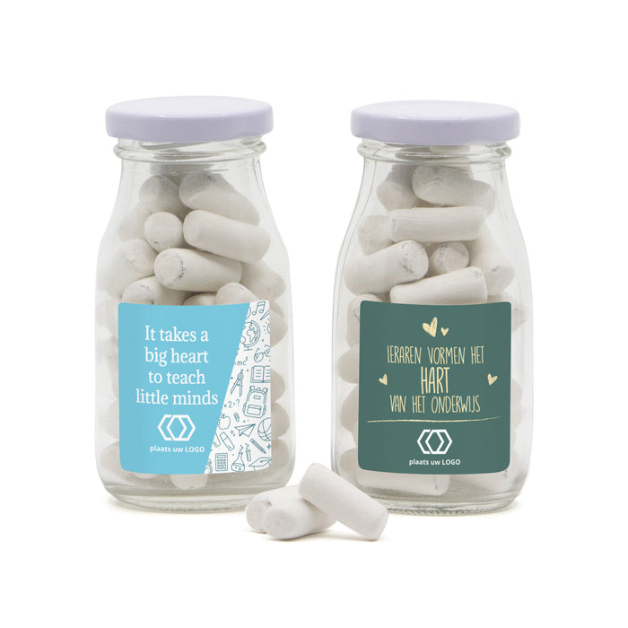 Glazen melkflesje met snoep - Leraar Glazen melkflesje met snoep - Leraar