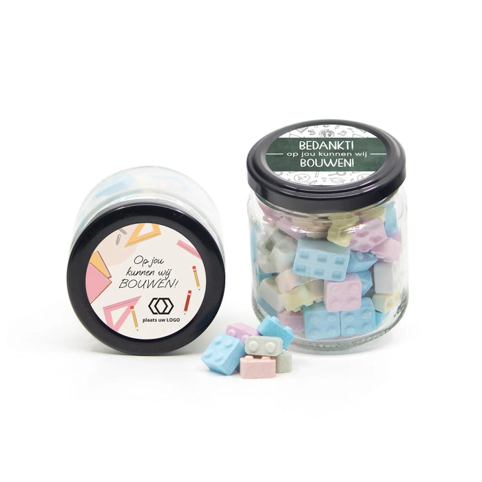 Glazen snoeppotje met bouwsteentjes- Leraar Glazen snoeppotje met bouwsteentjes- Leraar