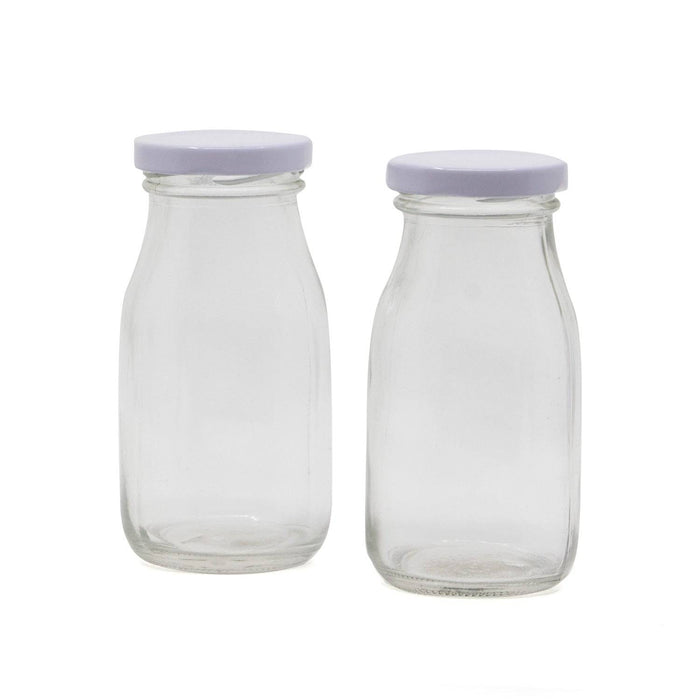 Glazen melkflesje leeg Glazen melkflesje leeg